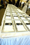 New graduates received Union license plate frames and key rings from alumni services at the August graduation reception. - Photo by Morris Abernathy