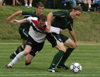 Freshman forward Benny Crozier battles a Belhaven player for possesion. - Photo by Jonathan Blair