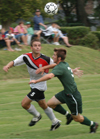 Senior captian Daniel Lee and a Belhaven (Miss.) player make a play on the ball.  - Photo by Jonathan Blair