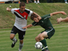 Dan Lee (5) battles a Belhaven player for possesion. - Photo by Jonathan Blair