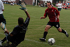 Kyle Sanders (red) prepares for a shot in Union's win over Delta State University. - Photo by Jonathan Blair