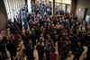 Ticket holders await the start of the Union University Scholarship Banquet in the atrium of the Carl Perkins Civic Center.  - Photo by Jim Veneman
