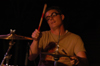Jesse Hornbeak plays drums in Jason Fitt's band during Fall Fest '04. - Photo by Jonathan Blair