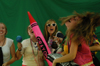 Freshman Carolyn Negley and her roommates make a music video toghether during Fall Fest 2004. - Photo by Jonathan Blair