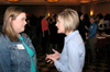 Kristin Wicker, university alumnae, talks with freshman Amelia Lewis after a Leading U conference. - Photo by Lindsay Stavish