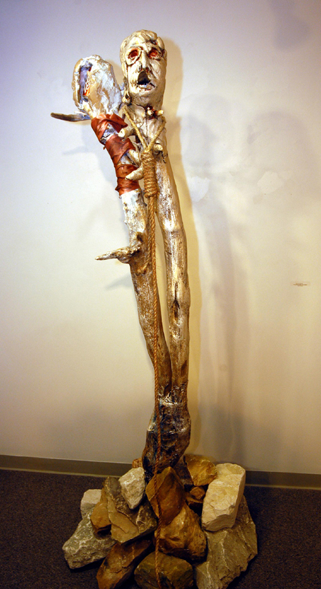Union art department faculty members displayed their work in the Union University Art Gallery during the month of November. This mixed media piece by Lee Benson is called "Art of Our Groans: Love Hurts."