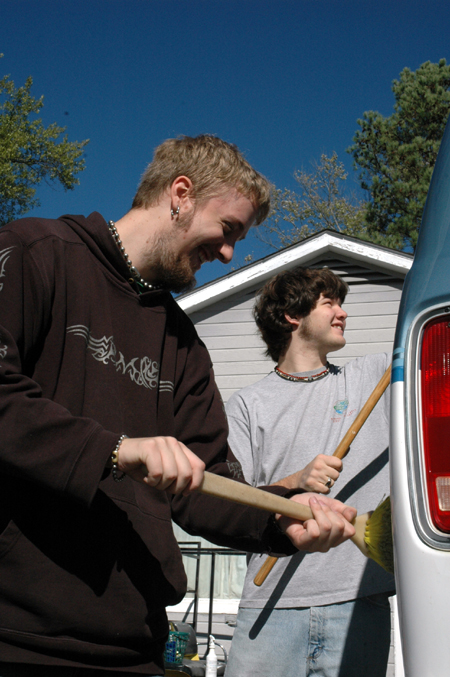 Junior Josh Hutcheson and sophomore Tyson Cadenhead washes a van at Birth Choice during Day of Remembrance.