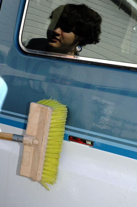 Sophomore Tyson Cadenhead washes a van at Birth Choice during Day of Remembrance.