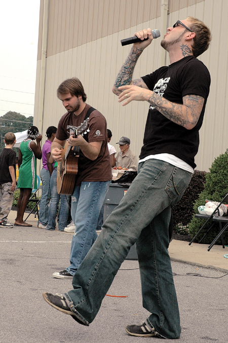 Josh Brown and Gregg Hionis, Day of Fire, perform
at Feed The Hungry day at Jackson Family Worship Center.