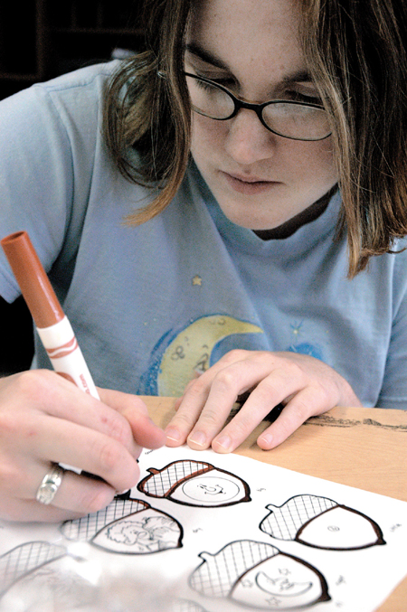 Sophomore, Heather Fleming recreates games lost during the tornado that hit Denmark Elementary. The second annual Day of Remembrance was a time to serve in Jackson.