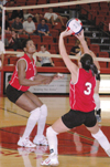 Senior Gladys Wandera waits for Senior Nicole
Garber’s set in a game against Cumberland. - Photo by Lauren Crane