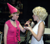 Junior Courtney Braswell & Senior Allie Campbell chat at Alpha Psi Omega's Costume Coffee House. - Photo by Amanda Herron