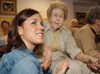 Sophomore Gina Orosz, social work major, spent the evening reminiscing with Mary Virginia Cox during SAC's "Night Under the Stars." - Photo by Kristen Hiller