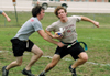 Sophomore Andy Robinette, engineering major, pulls flags from sophomore Douglas Martin, history major, before he can make it to the end zone at the Turkey Bowl event. - Photo by Kristen Hiller