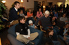 Student in the McAfee Commons listened closely as President Dockery read the Christmas story. - Photo by Morris Abernathy