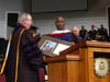President Dockery presented Barry Black with an honorary doctor of divinity degree during the fall graduation ceremony. - Photo by Morris Abernathy