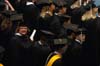 Eager graduates scan the audience for family and friends during fall graduation 2004. - Photo by Kristen Nicole Sayres