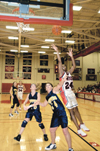 Senior Monica Elliot, management major, leans
into her shot against Blue Mountain College Thursday night. - Photo by Kathleen Murray