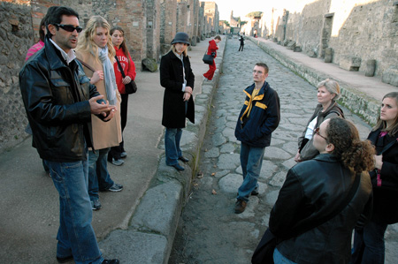 Dr. Pamela Sutton, English professor, and her students get a glimpse of the past during a guided tour of Pompeii on the annual Italy study tour.