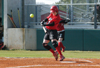 Allison Shein slaps the ball hoping to reach base in Union's game versus Lindsey Wilson. - Photo by Steven Aldridge