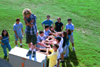 Keelan Cook's FOCUS group prepares to do the trust fall during New Student Orientation 2002. - Photo by Justin Veneman
