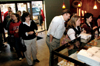 The line stretches out the door of the shop of the new local doughnut shop DoDahs. - Photo by Lindsay Stavish