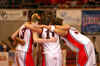 The five starters for Union hudle together prior to the opening tip of the title game in the NAIA Women's National Tournament. - Photo by Morris Abernathy