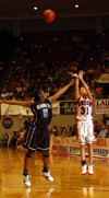 Freshman guard Merideth Richardson (31) shoots a three pointer during Union win in the title game of the NAIA National Tournament. - Photo by Morris Abernathy