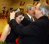 Union University president David S. Dockery crowns senior Lauren Oldham as 2005 Homecoming queen during halftime of the women's basketball game Feb. 19. - Photo by Morris Abernathy