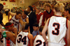 Head Coach Mark Campbell gives instructions during a timeout in the Homecoming game. - Photo by Morris Abernathy