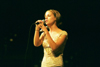 Freshman Amanda Raley sings in the Variety Show during New Student Orientation 2002. - Photo by Kristen Hiller