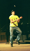 Freshman Wesley Calvert juggles at the Variety Show during New Student Orientation 2002. - Photo by Kristen Hiller