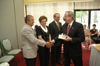 President Dockery presents facilities management's Pat Patterson with a retirement gift during his retirement reception. - Photo by Jim Veneman
