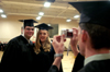 Broadcasting graduate Jonathan Yorkowitz and public relations graduate Jenny Eastman pose for a photo prior to the graduation ceremony. - Photo by Brad Moore