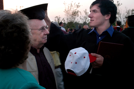 Theatre graduate Patrick Myers celebrates with his family shortly after the graduation ceremony.