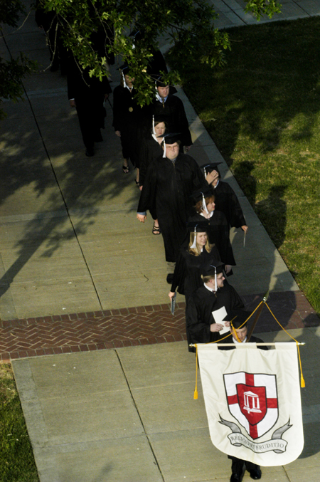 Graduates file onto the Great Lawn at the beginning of the ceremony.