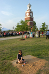 Not everyone was focused on the events happening on stage during spring graduation. - Photo by Morris Abernathy