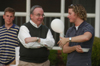 President Dockery fellowships with graduating senior Jeremy Warner during the Happy Trails social at the Dockery's. - Photo by Morris Abernathy