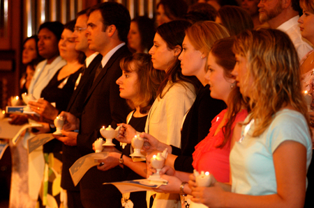 The Nursing Class of 2005 proudly holds its lamplight during the nursing dedication service.