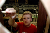 Junior Andy Morris works on the set of the theatre's production of <i>Shadowlands</i>. - Photo by Lindsay Stavish