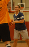 Intramural Basketball Action - Whitney Culver looks to make a pass inside. - Photo by Jonathan Blair