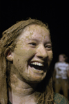 Junior Kathleen Lokey shows off her new mud facial during the Young Alums' Midnight Mudness. - Photo by Kathleen Murray