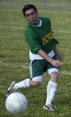Intramural Soccer Action - Bryan Spillman keeps his eyes on the ball. - Photo by Jonathan Blair
