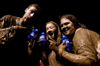 Juniors Chris Arnold, Kathleen Lokey and Karyn Caldwell proudly display their Midnight Mudness water bottles. - Photo by Kathleen Murray