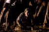 Junior Megan Fuller drives her way through the mud during the Young Alums' Midnight Mudness. - Photo by Kristen Nicole Sayres