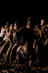 Juniors play leap frog during the Young Alums' annual Midnight Mudness event. - Photo by Kristen Nicole Sayres