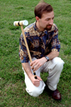 Graduating Senior Michael Kieffer ponders his next move during a croquet game during the Young Alums' Happy Trails social at the Dockery's. - Photo by Jonathan Blair
