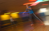 Freshman Drew Winter streaks down the floor during 80s Skate Night. - Photo by Jonathan Blair