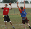 Intramural Flag Football Action - SAE Ross Watson attempts a pass while being guarded by Onion Micah Moyers. - Photo by Kristen Hiller