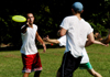 Intramural Ultimate Frisbee Action - LXA Joel Polk passes to teammate Gary Snuffin while an Onion defender attempts to intercept. - Photo by Kristen Hiller